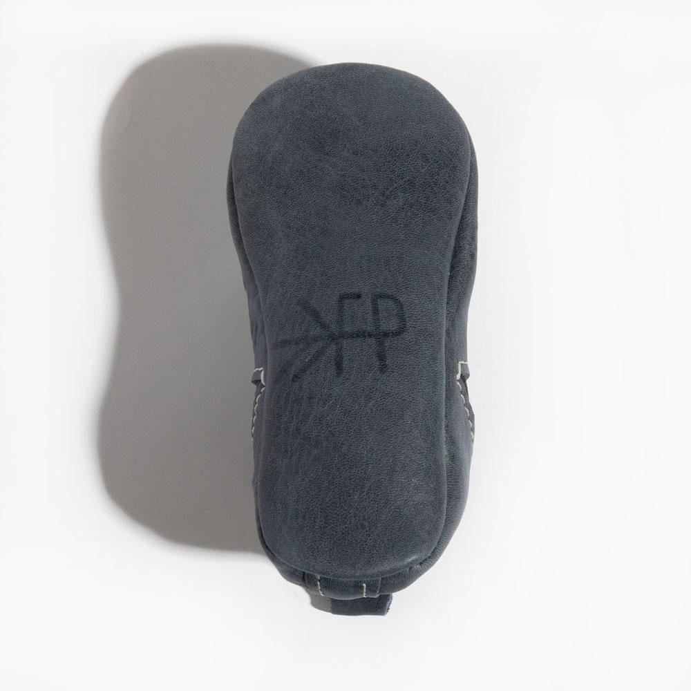 Freshly Picked Alta Chelsea Boot baby shoe sole logo close-up, genuine leather