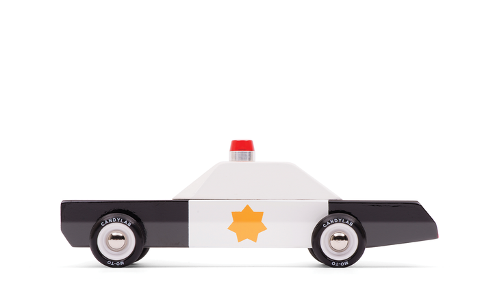 Plantoys Police Cruiser shown in a crisp side angle, designed as a classic police car toy for imaginative play.