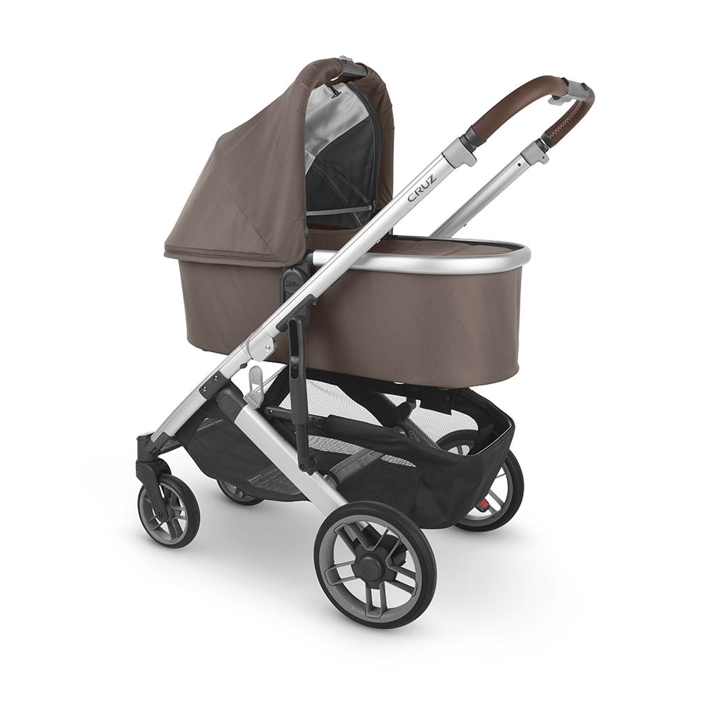 Side view of Uppababy Cruz with Bassinet attached 