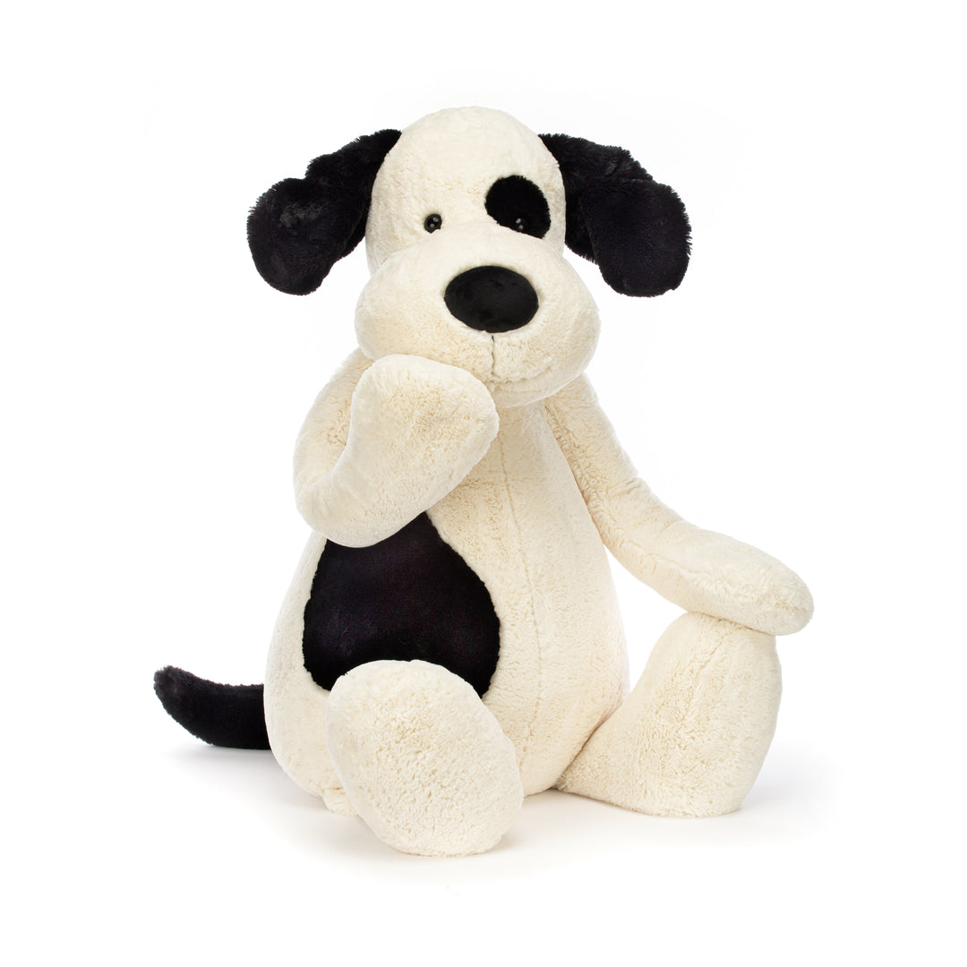 bashful black and cream puppy from jellycat stuffed animal dog