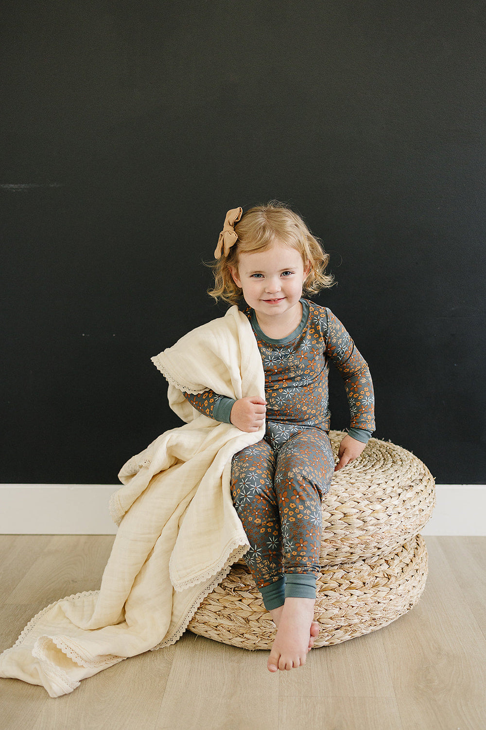 Nursery-ready, this Mebie Baby Cream Lace Muslin Quilt works as a stylish muslin throw blanket.