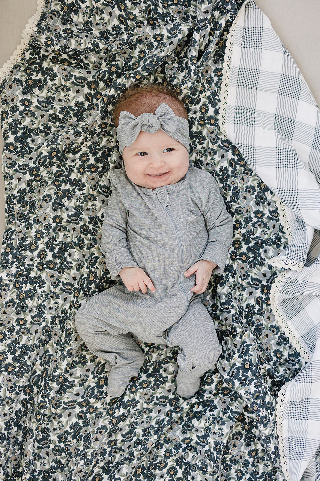Perfect for cuddle time, the Liberty Floral + Coastal Plaid Lace Muslin Quilt by Mebie Baby is a kids blanket for nursery.