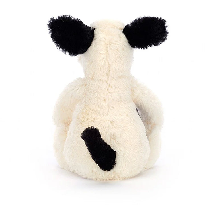 cute stuffed animal dog spots white and black