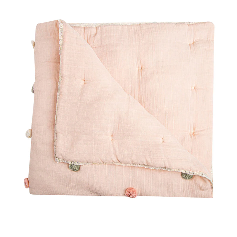 Soft and cozy Crane Baby Parker Pom Pom Blanket, a luxurious baby blanket perfect for snuggles and stroller rides.