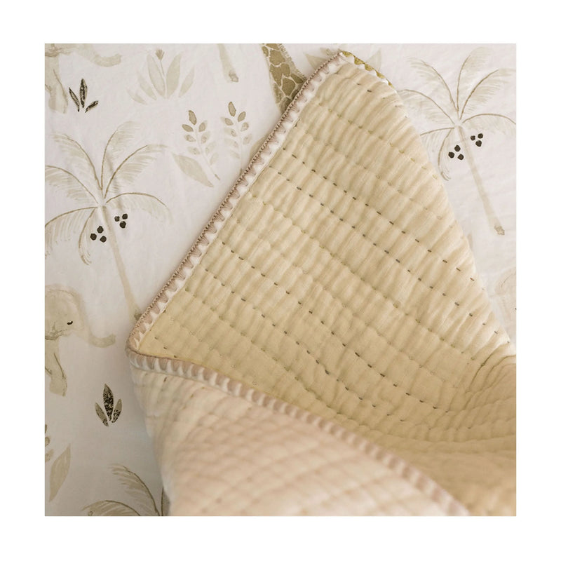 Luxurious Crane Baby Kendi Quilted Blanket, a versatile kids blanket designed for comfort at home or on the go.
