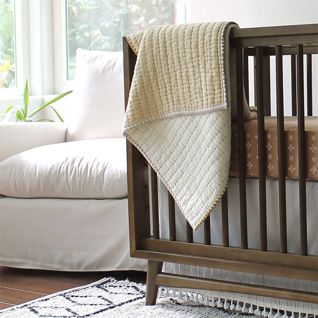 Crane Baby Kendi Quilted Blanket, soft and breathable baby blankets perfect for snuggles and nursery dŽcor.