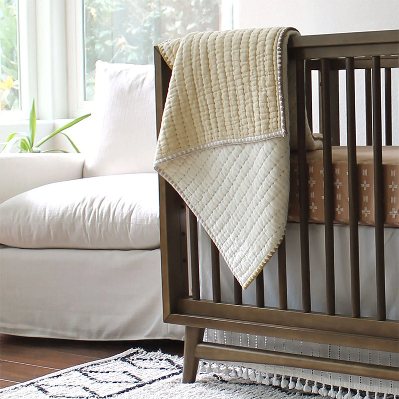 Crane Baby Kendi Quilted Blanket, soft and breathable baby blankets perfect for snuggles and nursery dŽcor.