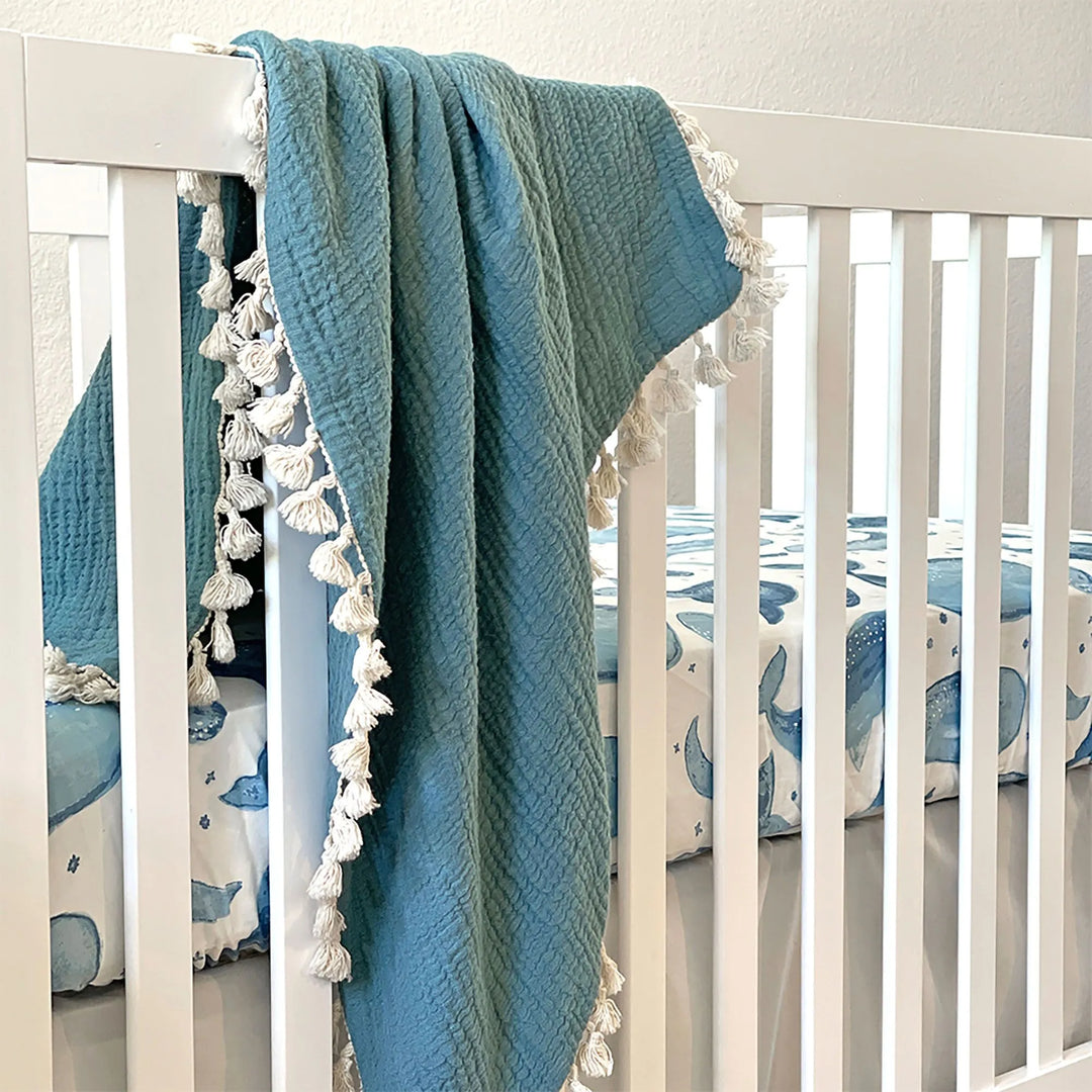 Breathable and soft Crane Baby 6 Layer Muslin Blanket Riverstone, one of the top muslin baby blankets for babies and toddlers.