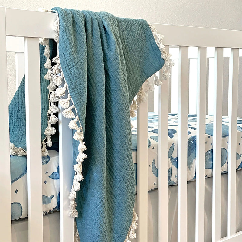 Breathable and soft Crane Baby 6 Layer Muslin Blanket Riverstone, one of the top muslin baby blankets for babies and toddlers.