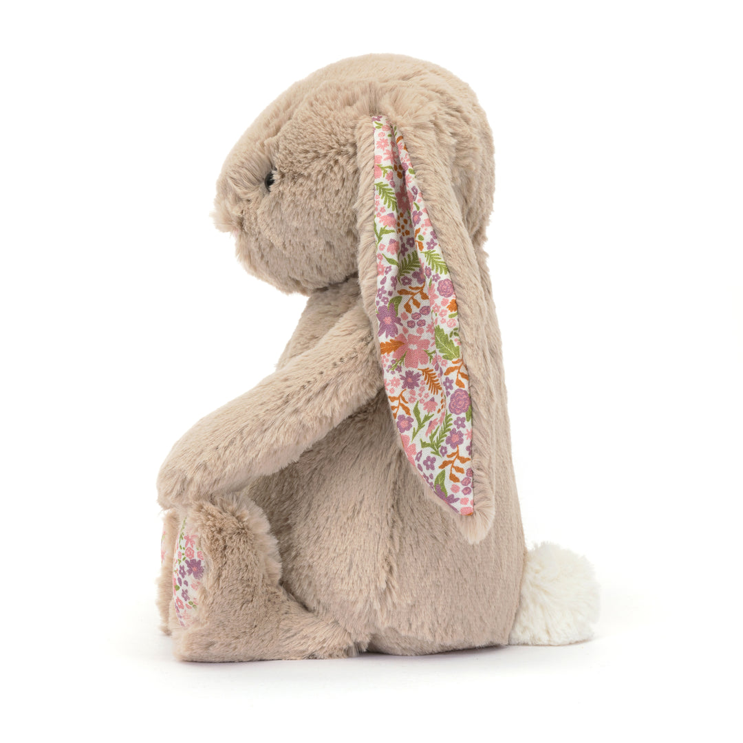 Jellycat Blossom Beige Bunny Petal plushies bring charm with floral ears and cozy hugs.