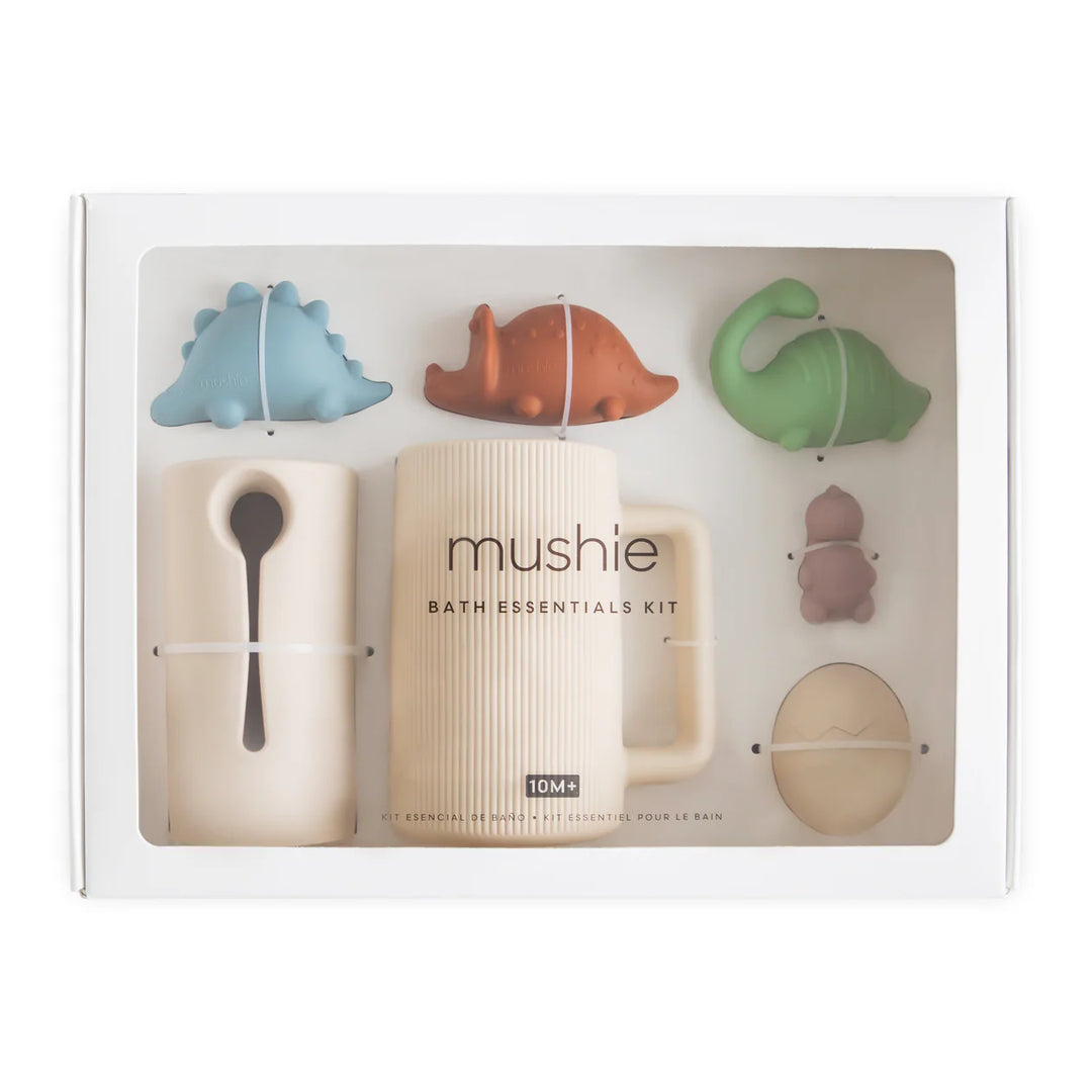 Mushie Dino Bath Essentials Kit in gift box - dinosaur-themed BPA-free silicone bath toys in kraft gift packaging