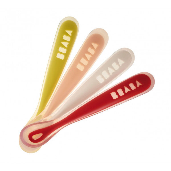 Four soft silicone baby spoons fanned out in yellow, peach, grey and red, Béaba 1st Stage Silicone Spoon Set of 4 Neon