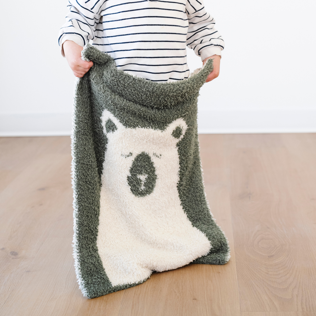 Warm and plush, the Saranoni Double-Layer BAMBONI¨ Mini Blanket in Bear brings comfort and calm Ñ a beloved best baby blanket.