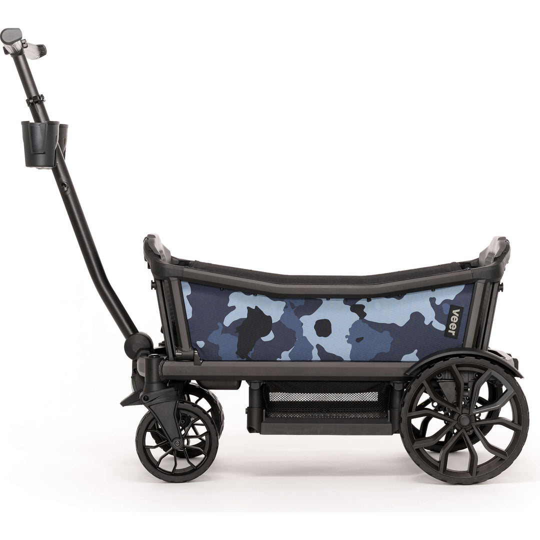 Add playful flair to your kids wagon stroller with the Veer Cruiser Custom Sidewall Kit in Blue Camo, great for outdoor fun.