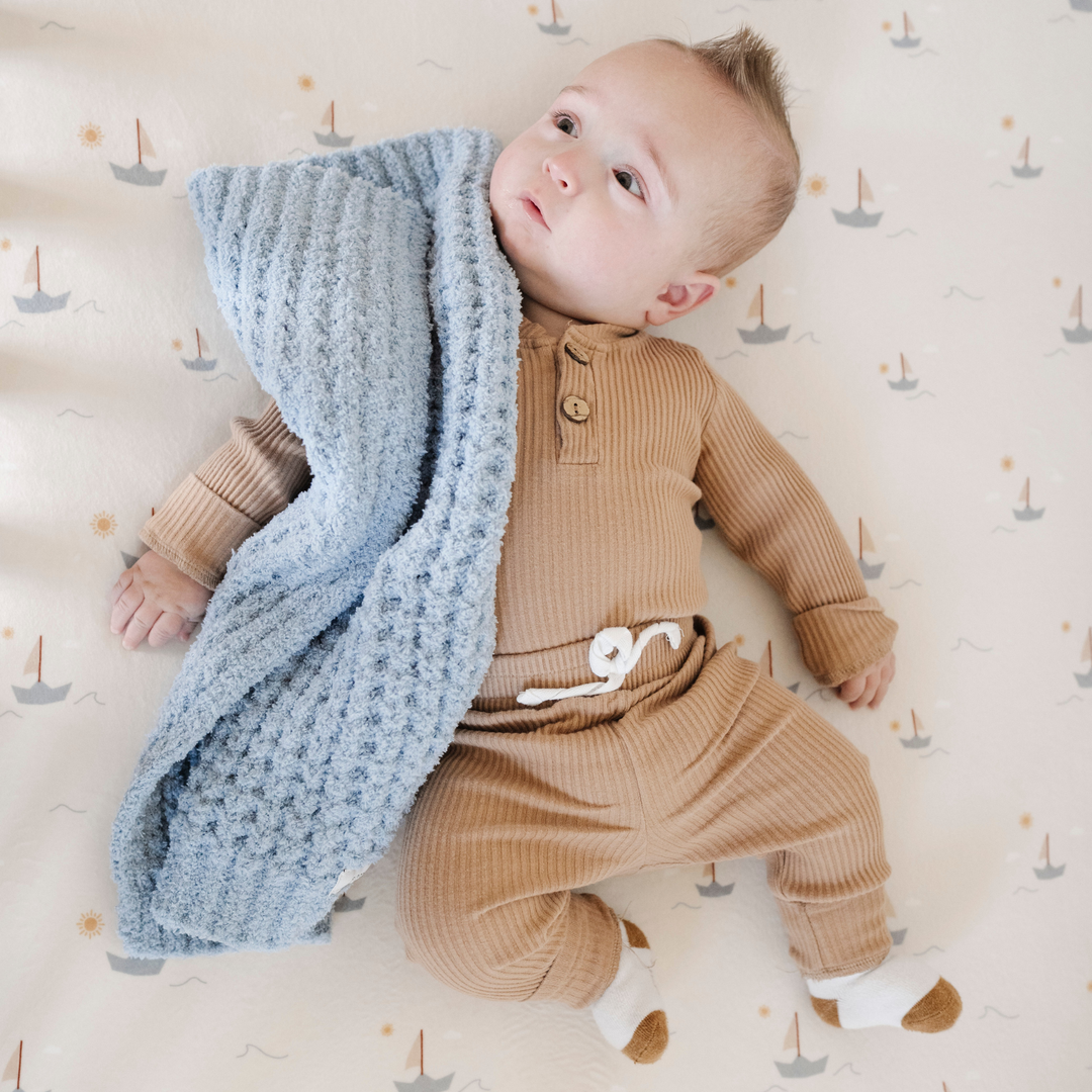 Blue Jay Saranoni Waffle Knit Mini Blanket adds simple everyday soothing comfort for Baby blankets.