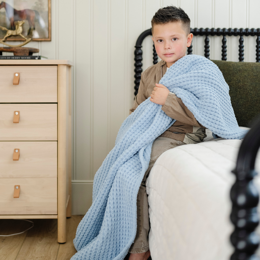 Saranoni Waffle Knit Toddler Blanket in Blue Jay brings timeless charm and softness to baby blankets.