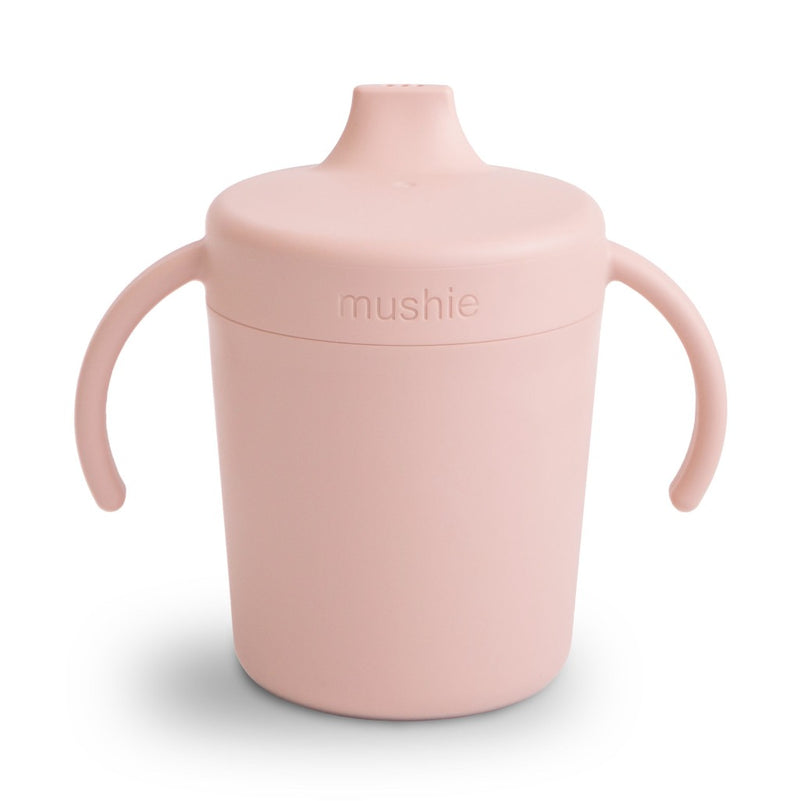 Blush Trainer Sippy Cup Soft blush-colored trainer sippy cup ideal for helping babies learn to drink independently