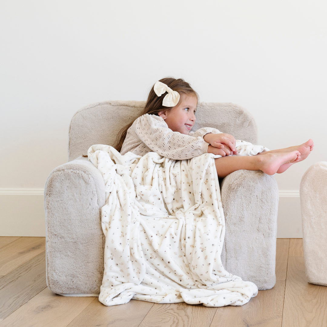 Soft and inviting, the Buff Saranoni Snuggle Up Chair is a plush kids lounge chair little ones enjoy.