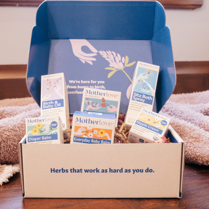 Close-up of Motherlove Bump to Baby Gift Box, perineal massage oil and pregnancy skincare items