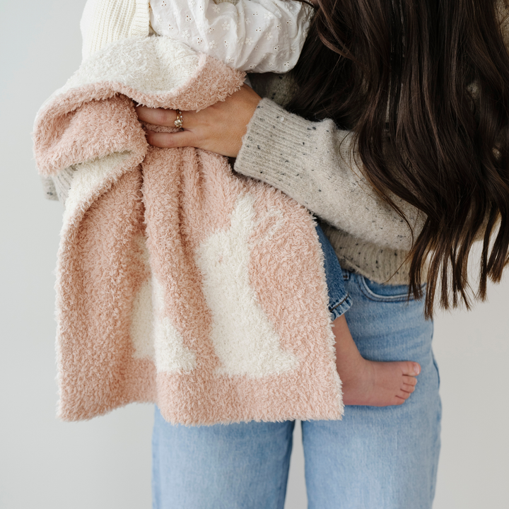 The Saranoni Double-Layer BAMBONI¨ Mini Blanket in Bunny Pink offers luxury softness, making it a top-rated baby blanket choice.