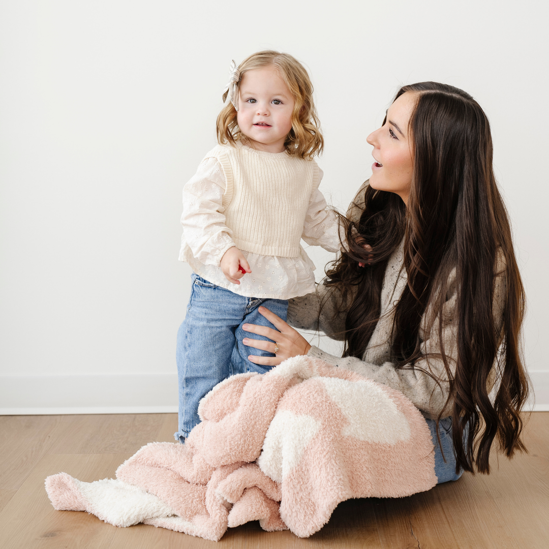 SaranoniÕs Bunny Pink Double-Layer BAMBONI¨ Mini Blanket delivers soothing texture, perfect for best blankets for toddlers.