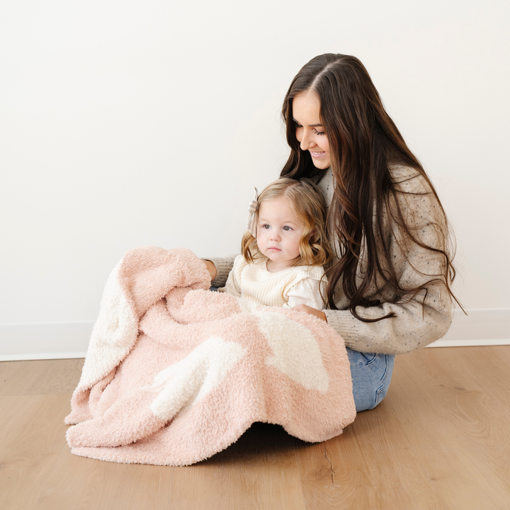 Wrap your baby in comfort with the Saranoni BAMBONI¨ Receiving Blanket in Bunny, a premium soft baby blanket.