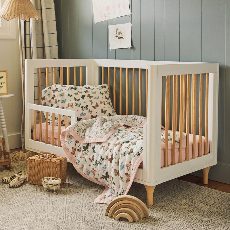Styled nursery with Little Unicorn Cotton Muslin Toddler Bedding 3 Piece Set - Butterflies, cheerful baby crib bedding.