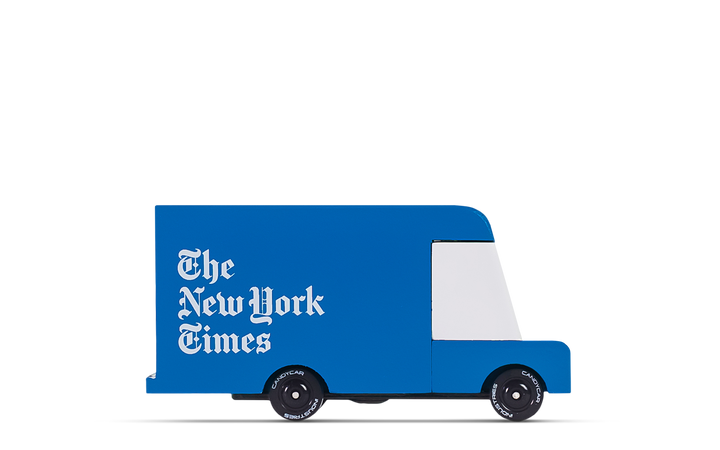 Side view of Plantoys New York Times Van, a wooden toy car perfect for toy cars for kids.