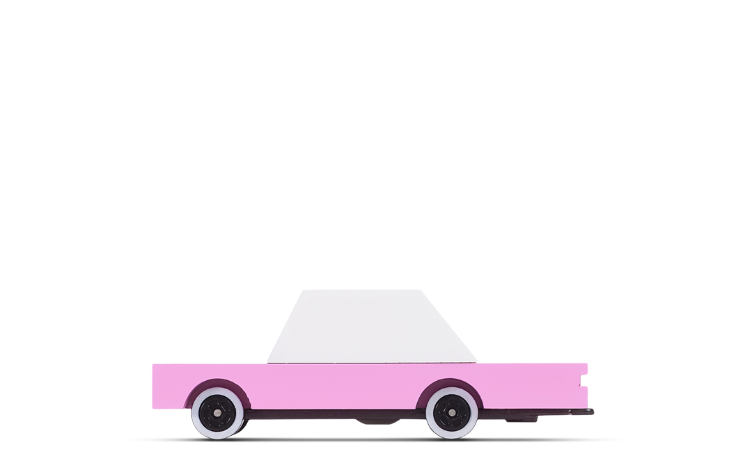 Plantoys Pink Sedan race car toy in bright pink, perfect for toddlers who love toy race cars.
