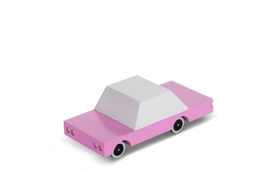 Toy cars for toddlers: Plantoys Pink Sedan wooden car toy adds fun to playtime.