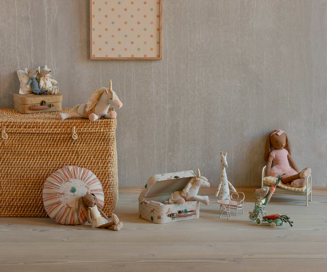 Maileg Medium Unicorn whimsical soft toy styled in nursery playroom with Maileg dolls and accessories