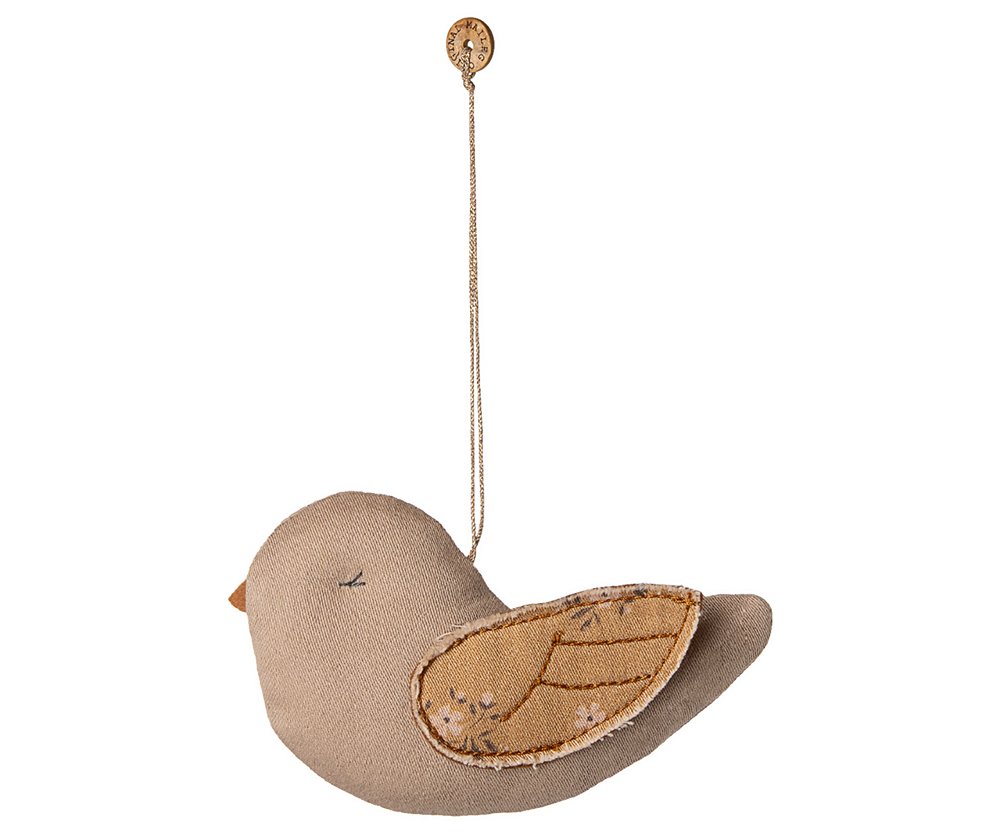 Shown perched and delicate, the Maileg Fabric Bird Ornament in Mable Latte adds sweetness to any Christmas ornament display.