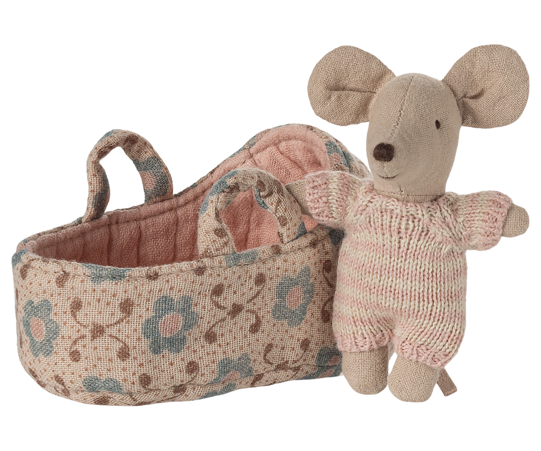 Tiny cuddles abound as the Maileg Baby Mouse lounges in a cozy Carry Cot.