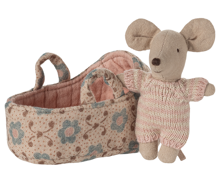 Tiny cuddles abound as the Maileg Baby Mouse lounges in a cozy Carry Cot.