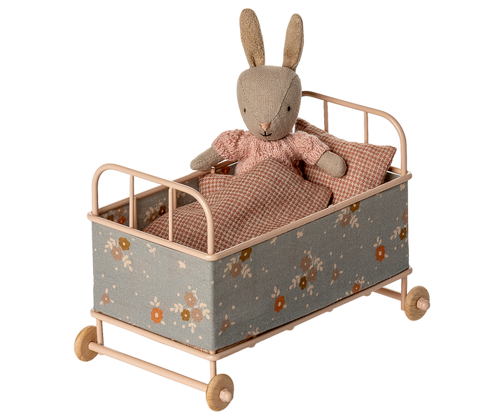 maileg small metal cot with a small bunny inside underneath blanket