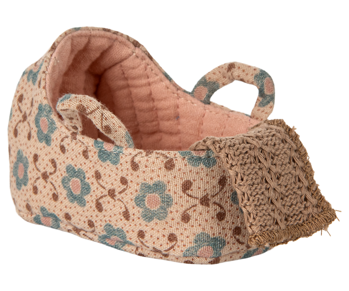 Shown here is the Maileg Mouse Carry Cot, a tiny essential that enhances any Maileg mouse house scene.