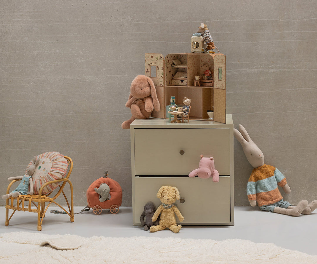 The Maileg SuitCasa appears in a whimsical layout, offering a cute backdrop for Dolls and creative playtime.