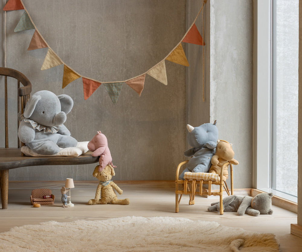 Maileg Small Yellow Hippo cream yellow stuffed animal styled in Scandinavian nursery play scene