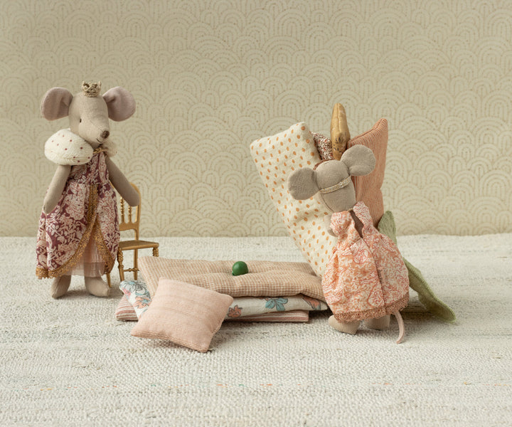 vignette scene featuring maileg mouse princess and the pea with queen mouse in background