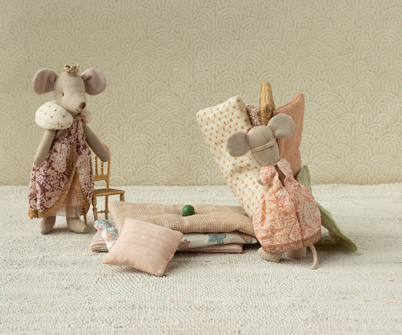 vignette scene featuring maileg mouse princess and the pea with queen mouse in background
