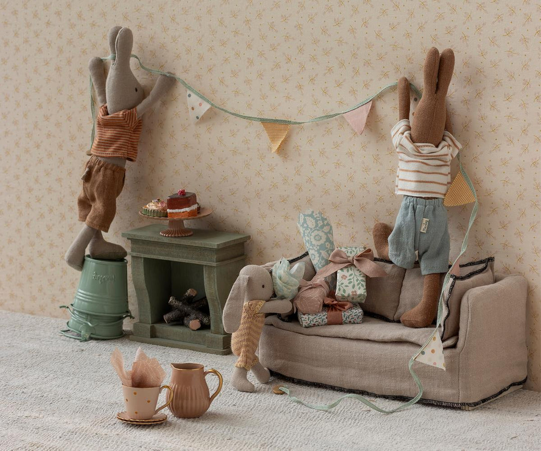 Maileg Bunny Micro Dark Powder in living room scene with Maileg sofa and rabbit family characters
