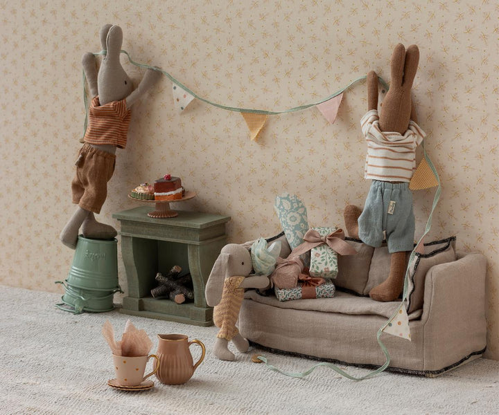 Maileg Bunny Micro Dark Powder in living room scene with Maileg sofa and rabbit family characters