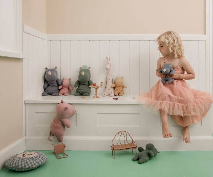 Maileg Small Yellow Hippo plush cream yellow in childrenÕs playroom with Maileg dolls and toys