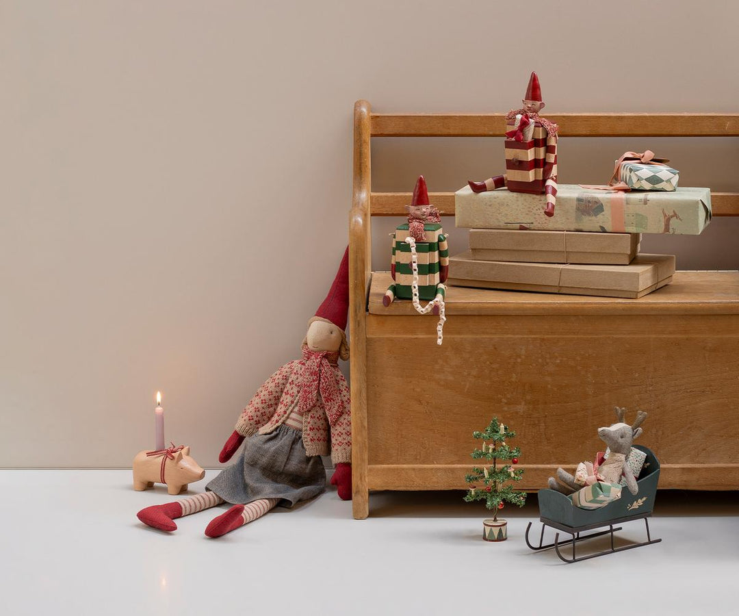 Maileg mice riding in the Green Mouse Sleigh, lifestyle scene