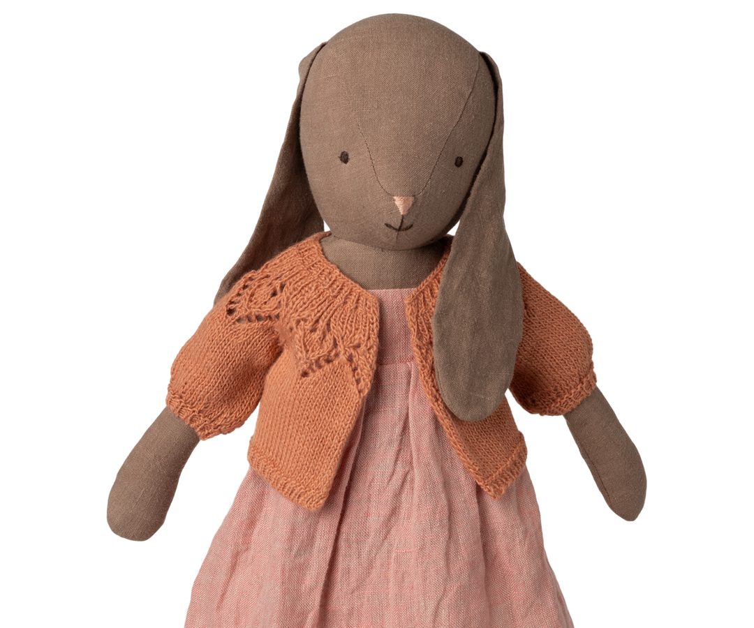 close-up of Maileg size 4 rabbit in vintage rose cardigan, knitted bunny doll outfit detail