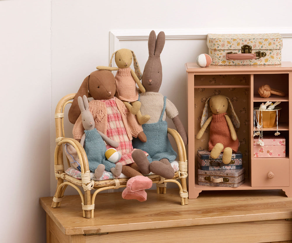 Maileg size 3 brown rabbit in knitted outfit lifestyle scene with Maileg dollhouse furniture