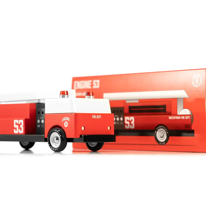 Wooden toy fire truck by Candylab, part of the Engine 53 collection.