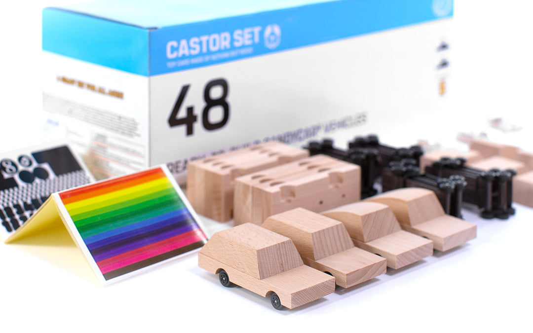 Arranged neatly, the Plantoys Castor Setª 48 Pack displays its cars and accessories as an engaging small toy cars collection.