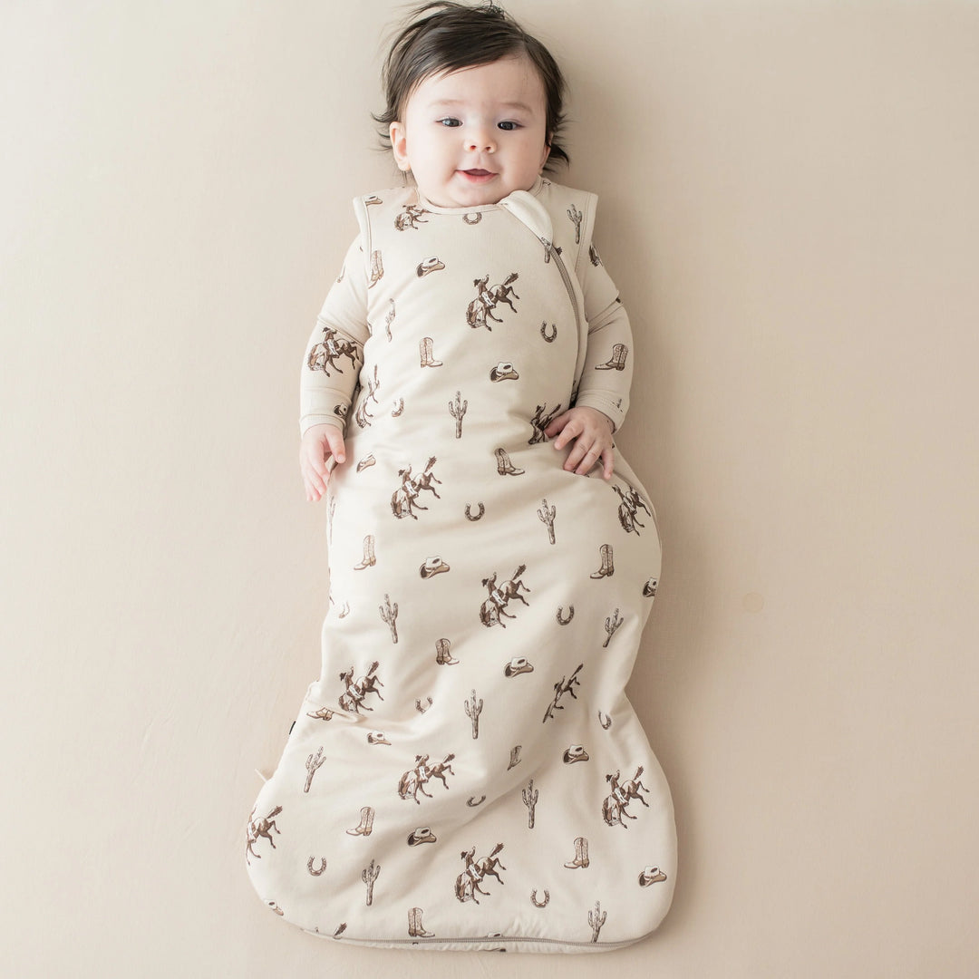 Soft bamboo construction shines in the Kyte Baby Baby Sleep Sack Tog 1.0 in Classic Cowboy, a gentle newborn sleep sack for everyday use