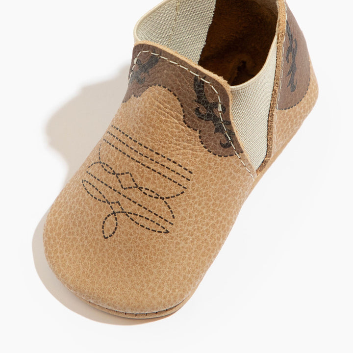 Freshly Picked Cowboy Chelsea Boot baby shoe close-up, stitched cowgirl detail